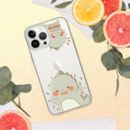Phone case with a cute dinosaur design on a surface with fruits and leaves