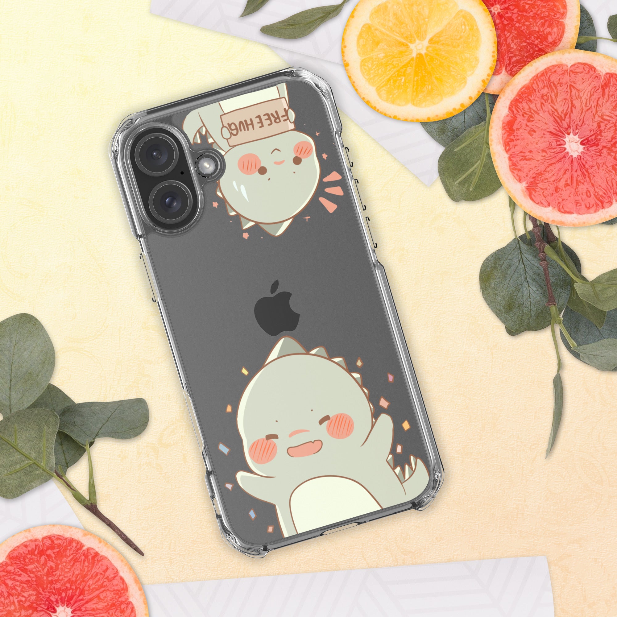 Phone case with cute design on a yellow surface with fruit and leaves