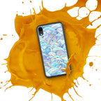 Phone case with colorful design on a yellow splash background