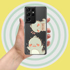 Phone case with cartoon character held by a hand against a yellow background