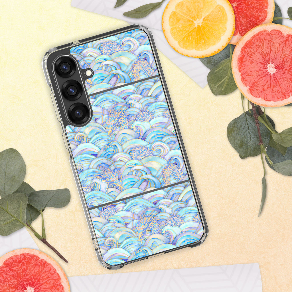 Phone case with ocean wave design on a yellow surface with fruit and leaves
