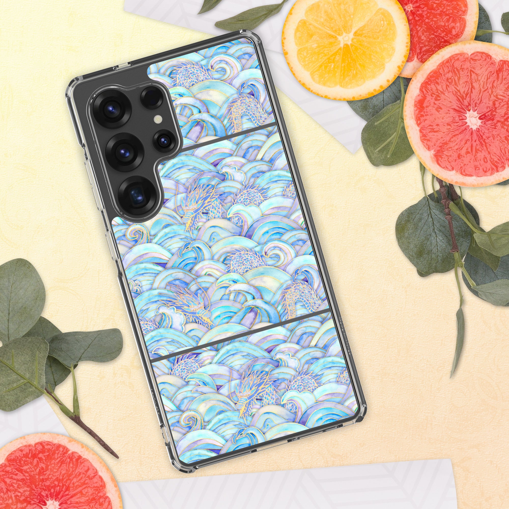 Phone case with a blue wave pattern on a yellow background with fruits and leaves