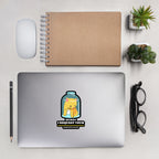 Laptop with a sticker on a desk with a notebook, mouse, pencil, and glasses.