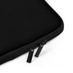 Black laptop sleeve with zipper on a white background