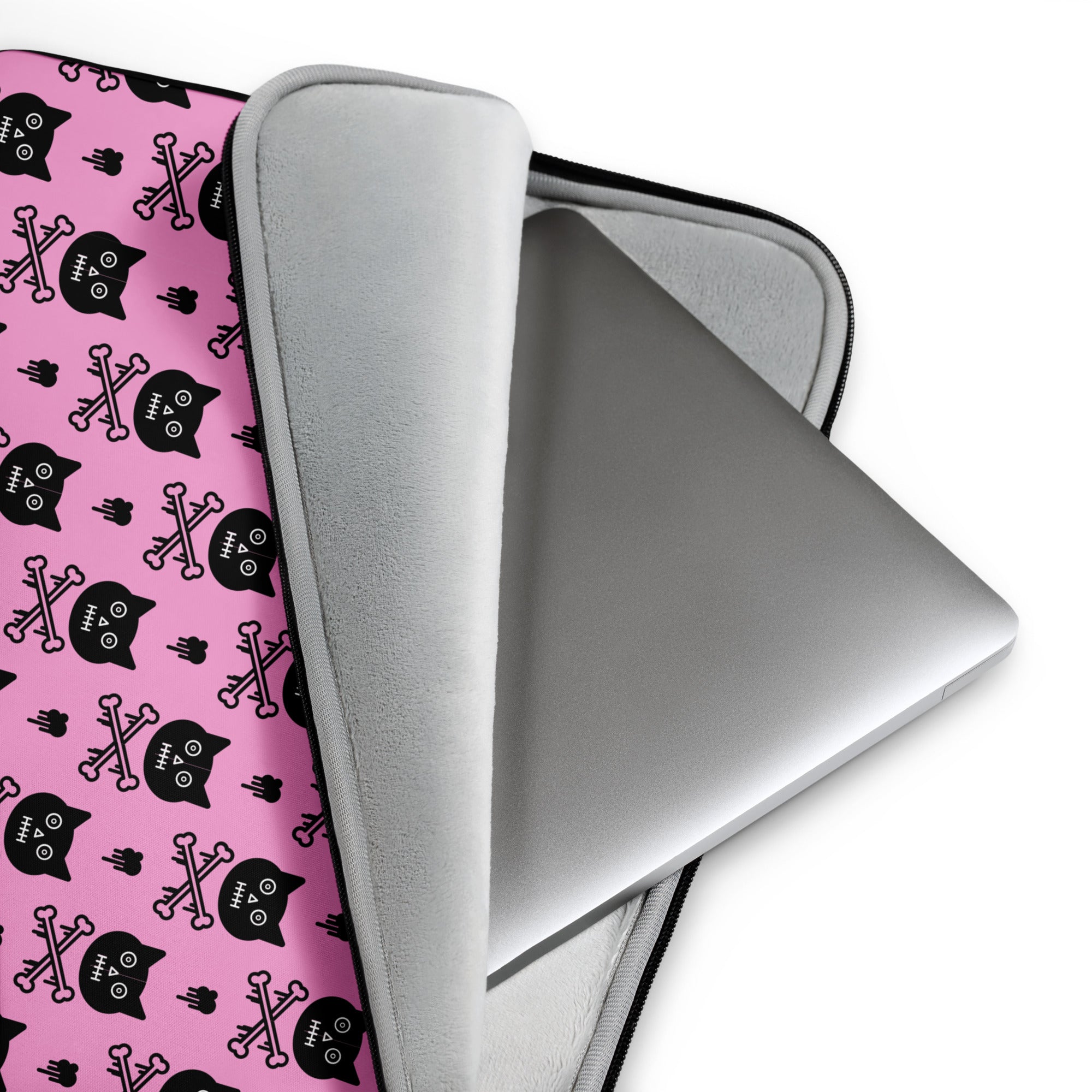 Laptop sleeve with pink background and black cat and crossbones pattern