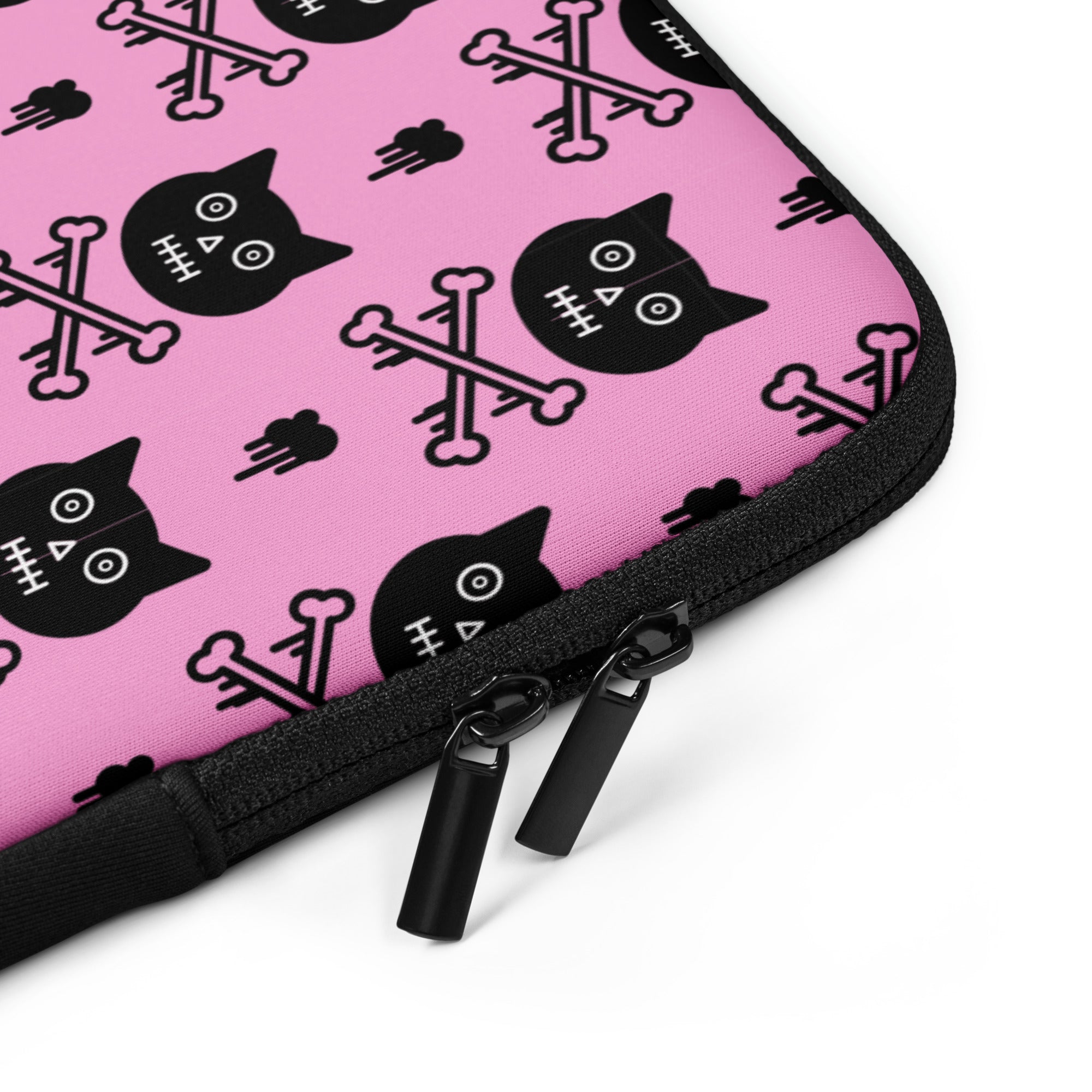 Pink pouch with black cat and crossbones pattern on a white background