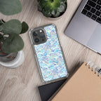 Phone case with blue and white pattern on a wooden desk with laptop and notebook