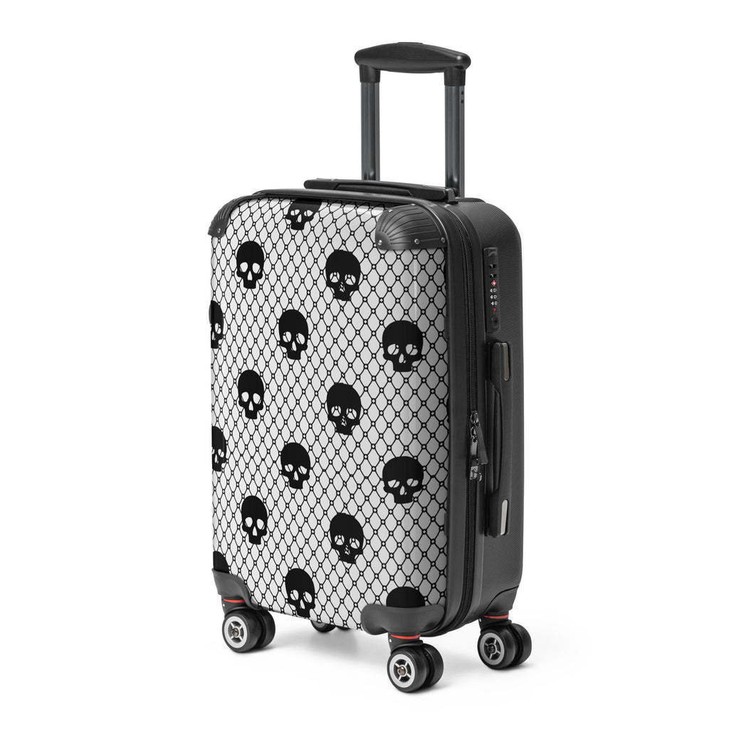 Black suitcase with skull pattern on a white background
