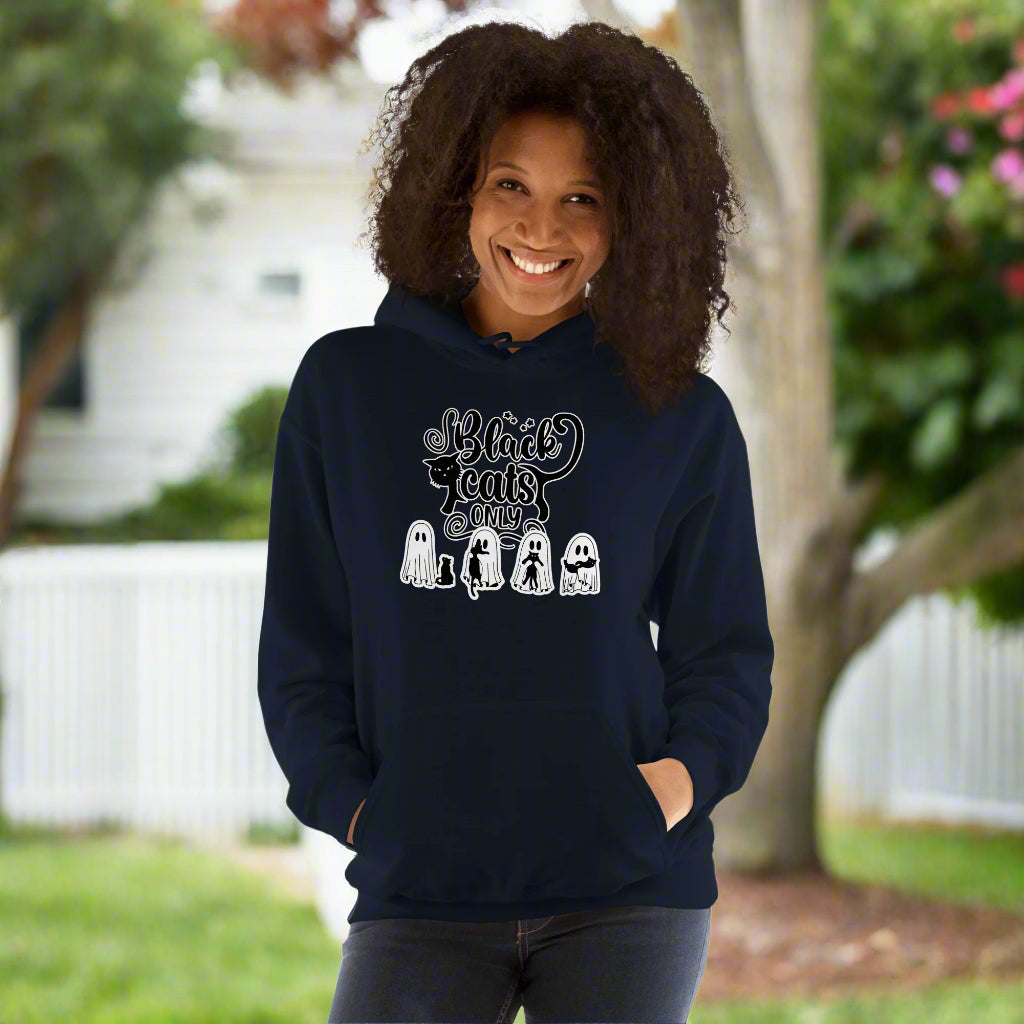 Person wearing a navy hoodie with text and graphics on a white background